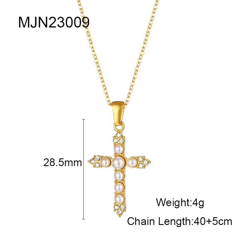 Gold cross pendant necklace close up — Kimoore