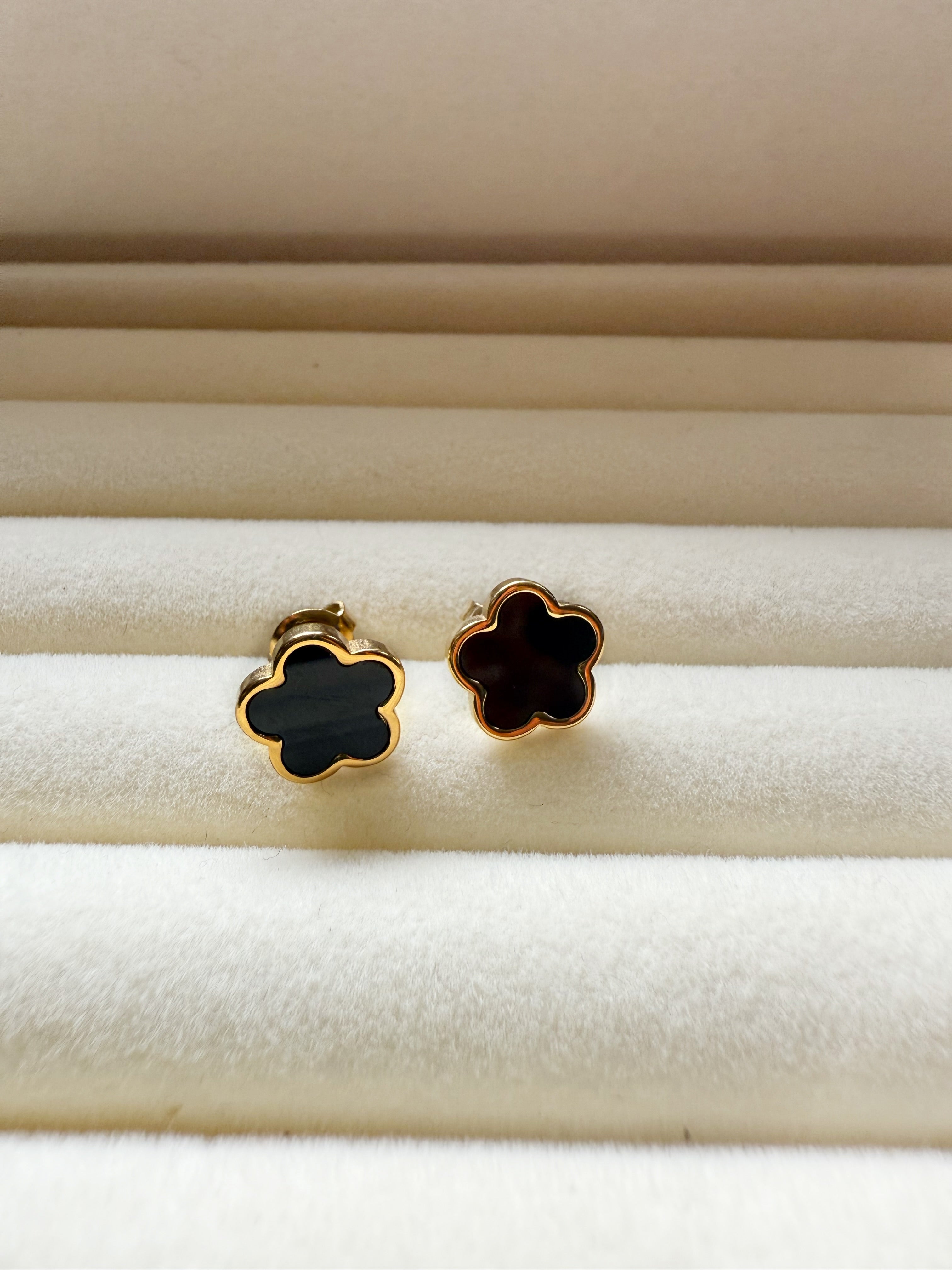 Lucky clover earrings on ear — Kimoore