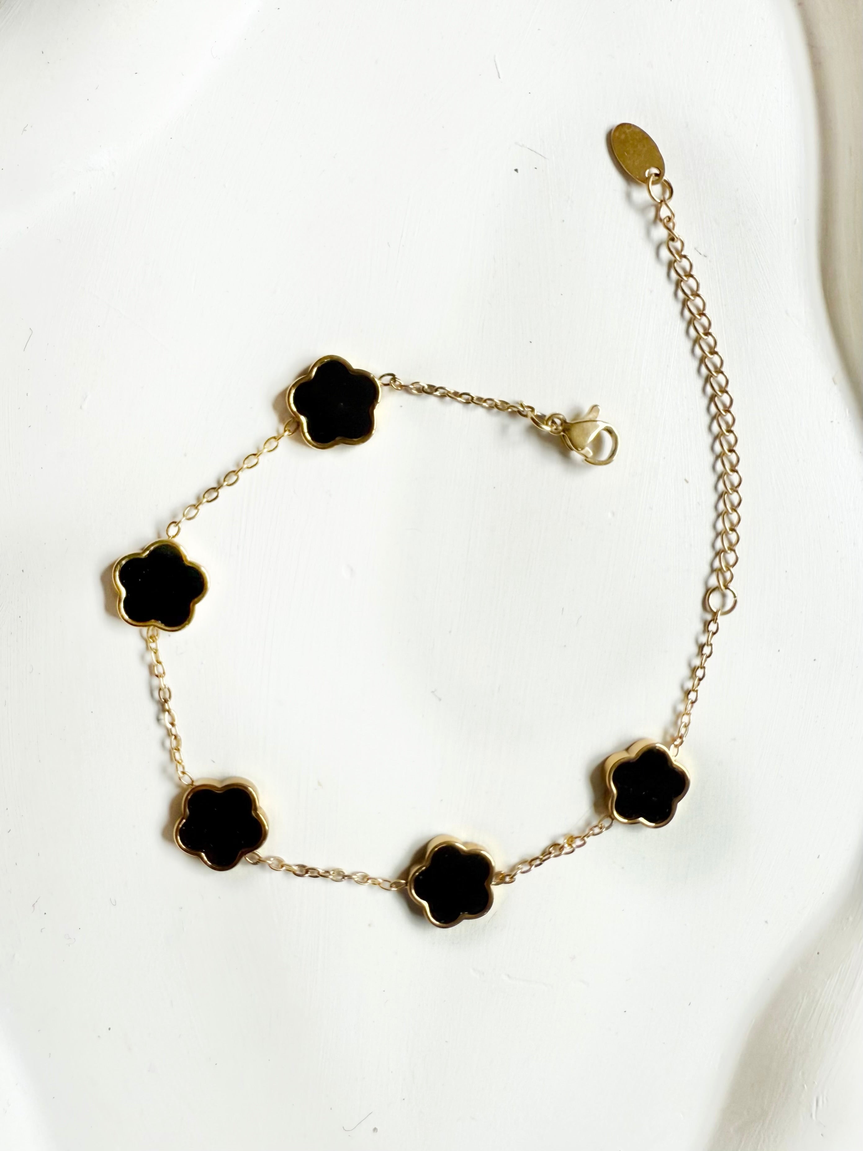 Lucky clover bracelet on wrist — Kimoore